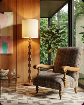 An armchair beside a floor lamp