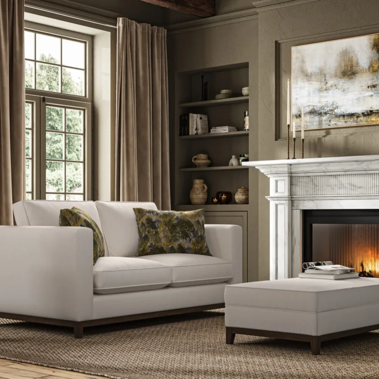 A cream sofa beside a lit fireplace in a bright living room